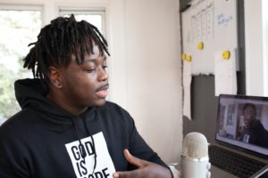 Black man recording a streaming
